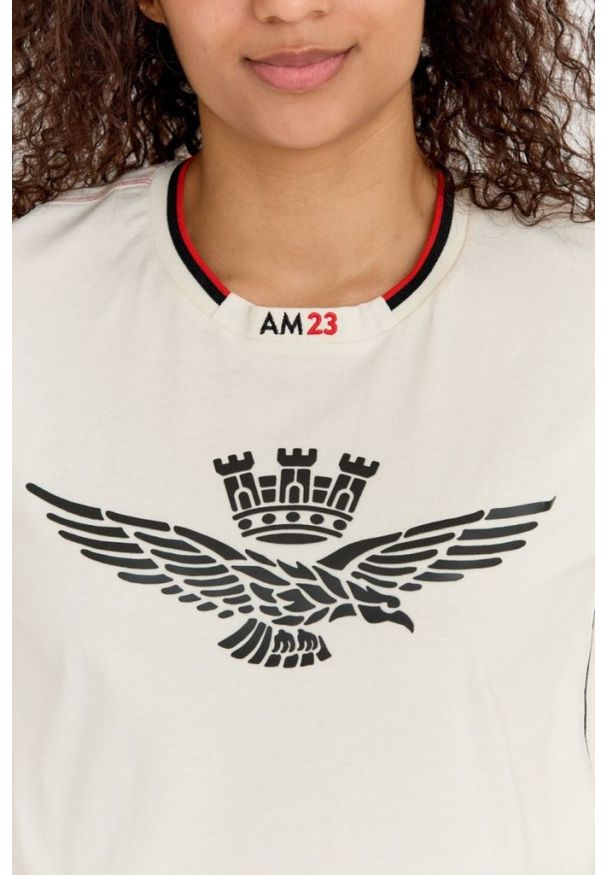 Aeronautica Militare - AERONAUTICA MILITARE Kremowy luźny t-shirt damski z wypukłym orłem Comfort Fit. Kolor: beżowy. Materiał: bawełna