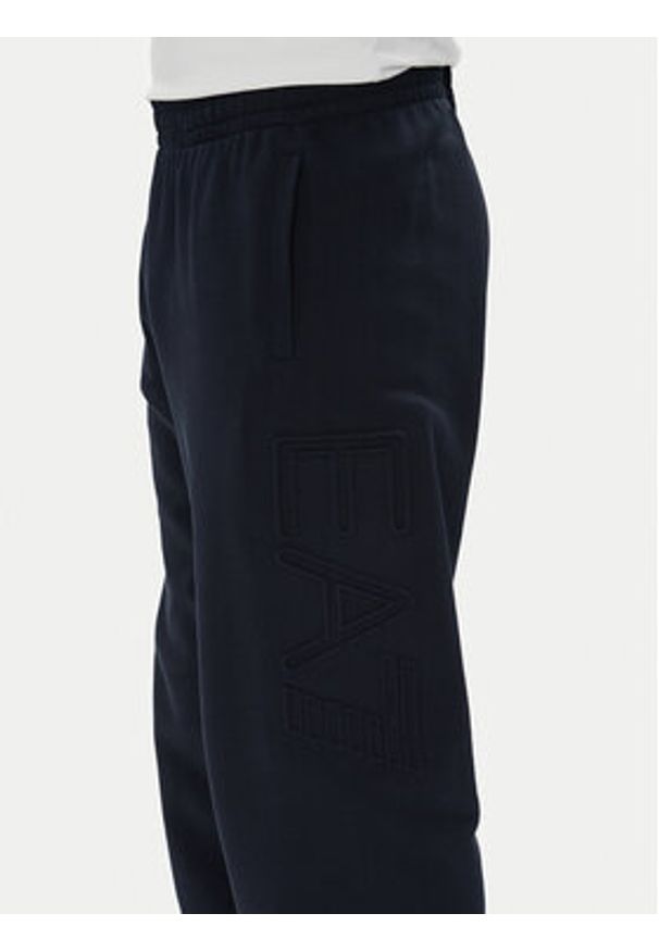 EA7 Emporio Armani Spodnie dresowe 7M000154 AF10432 UB102 Granatowy Regular Fit. Kolor: niebieski. Materiał: bawełna