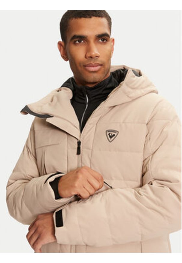 Rossignol Kurtka narciarska RLMMJ06 Beżowy Regular Fit. Kolor: beżowy. Materiał: syntetyk. Sport: narciarstwo