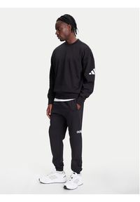 Adidas - adidas Spodnie dresowe Essentials Linear Fleece JN1786 Czarny Regular Fit. Kolor: czarny. Materiał: bawełna #4