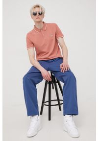 Lee spodnie męskie w fasonie chinos. Kolor: niebieski. Materiał: lycra, bawełna, materiał, tkanina. Wzór: gładki