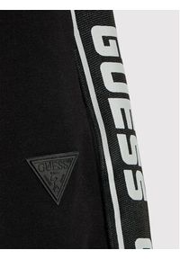 Guess Spodnie dresowe L2YQ48 K6ZS1 Czarny Regular Fit. Kolor: czarny. Materiał: bawełna