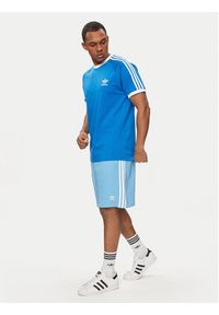 Adidas - adidas Szorty sportowe adicolor 3-Stripes IR8008 Niebieski Regular Fit. Kolor: niebieski. Materiał: bawełna. Styl: sportowy #3