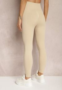 Renee - Beżowe Legginsy Prążkowane z Efektem Push-Up High Waist Firale. Stan: podwyższony. Kolor: beżowy. Materiał: prążkowany