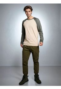 Sinsay - Spodnie jogger - zielony. Kolor: zielony