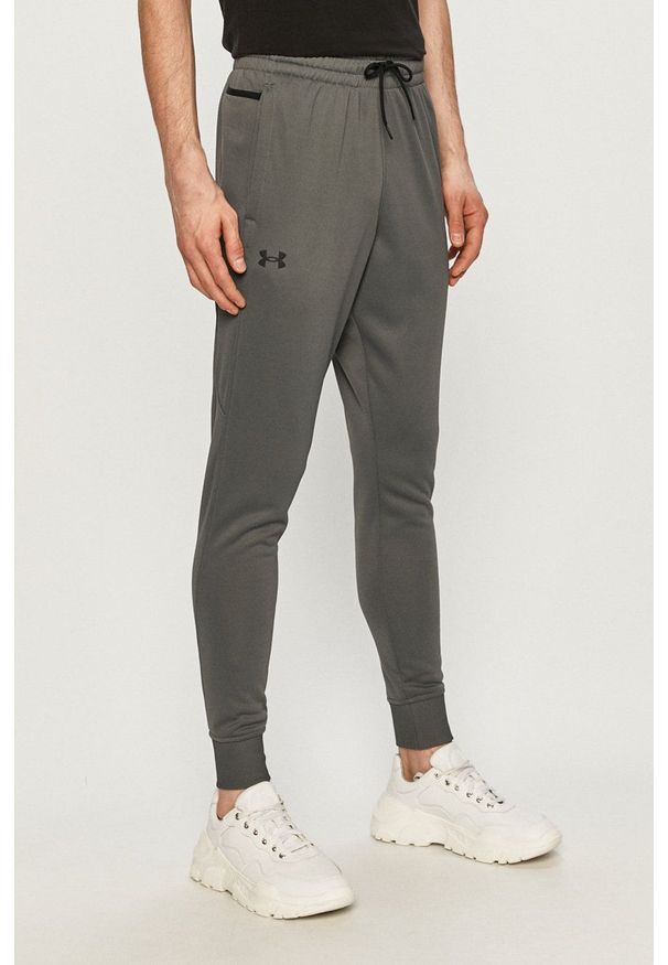 Under Armour - Spodnie. Okazja: na co dzień. Kolor: szary. Styl: casual