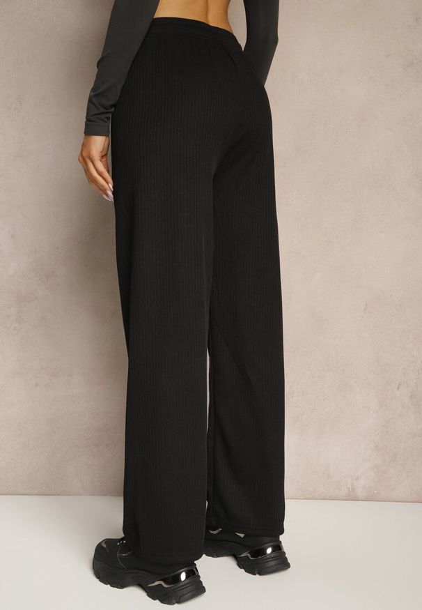 Renee - Czarne Spodnie o Szerokim Kroju High Waist Savianne. Okazja: na co dzień. Stan: podwyższony. Kolor: czarny. Sezon: wiosna. Styl: casual