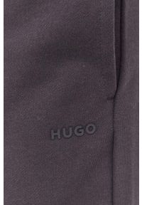 Hugo - HUGO spodnie dresowe bawełniane kolor szary gładkie. Kolor: szary. Materiał: bawełna, dresówka. Wzór: gładki #4