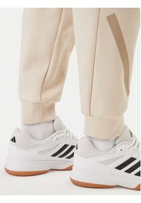 Adidas - adidas Spodnie dresowe Z.N.E. KE4684 Beżowy Regular Fit. Kolor: beżowy. Materiał: syntetyk #3