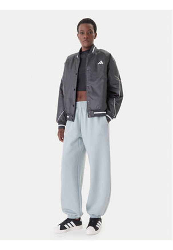 Adidas - adidas Spodnie dresowe Soft Lux KA7018 Zielony Loose Fit. Kolor: zielony. Materiał: syntetyk