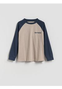 Reserved - Bawełniany longsleeve z nadrukiem - kremowy. Kolor: kremowy. Materiał: bawełna. Długość rękawa: długi rękaw. Wzór: nadruk