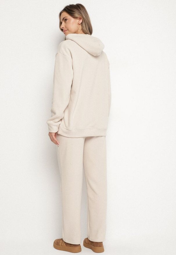 Born2be - Beżowy Bawełniany Komplet Dresowy z Bluzą i Spodniami Zansira. Kolor: beżowy. Materiał: bawełna, dresówka