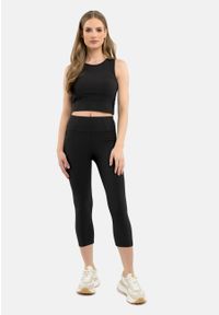 Volcano - Prążkowane legginsy 3/4 N-PALERMO. Stan: podwyższony. Kolor: czarny. Materiał: prążkowany. Długość: krótkie. Wzór: napisy, prążki. Styl: klasyczny, sportowy #1