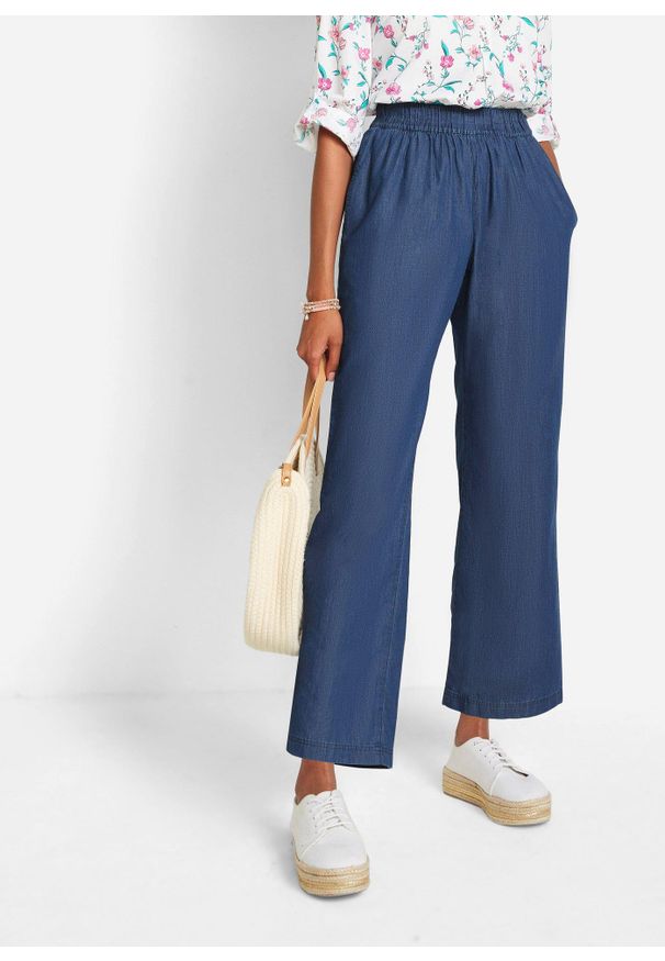 bonprix - Lekkie dżinsy z gumką w talii, szerokie nogawki. Kolor: niebieski