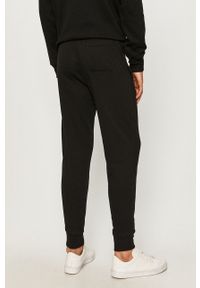 GAP - Spodnie. Kolor: czarny. Wzór: aplikacja #3