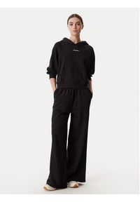 Tommy Jeans Spodnie dresowe DW0DW22951 Czarny Relaxed Fit. Kolor: czarny. Materiał: bawełna #5