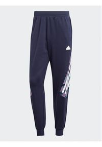 Adidas - adidas Spodnie dresowe Future Icons Allover Print IJ8853 Granatowy Regular Fit. Kolor: niebieski. Materiał: syntetyk. Wzór: nadruk #3