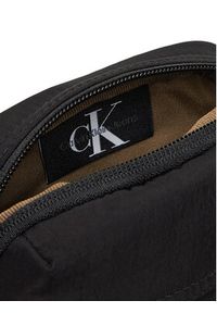 Calvin Klein Jeans Saszetka Metro Nylon Reporter Bag LV04G3089G Czarny. Kolor: czarny. Materiał: materiał #4