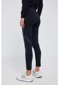 Calvin Klein Jeans Legginsy damskie kolor czarny gładkie. Kolor: czarny. Materiał: bawełna, dzianina. Wzór: gładki #3