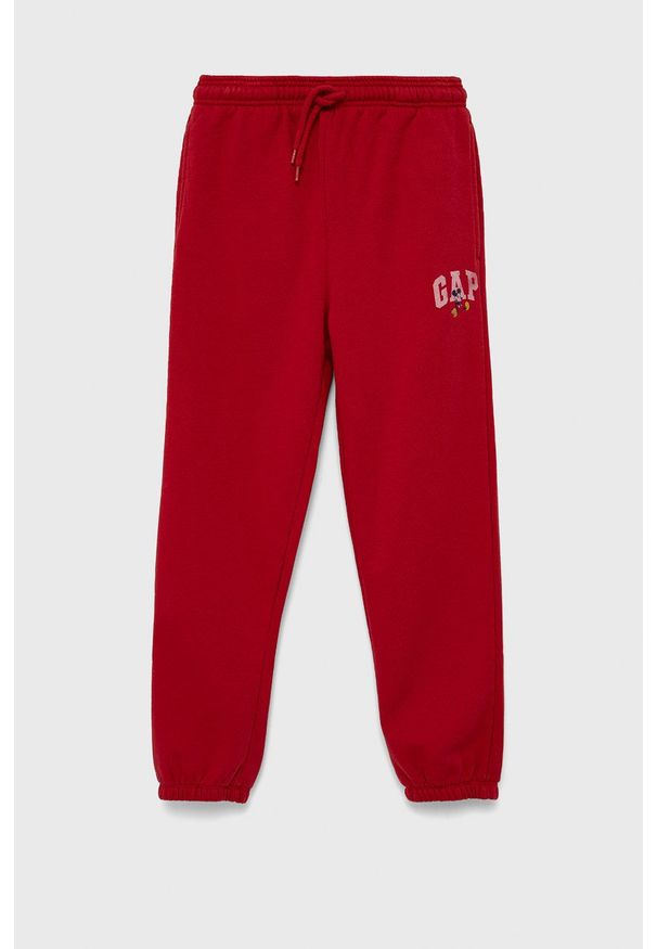 GAP spodnie dziecięce x Disney kolor czerwony z nadrukiem. Kolor: czerwony. Materiał: poliester. Wzór: nadruk, motyw z bajki