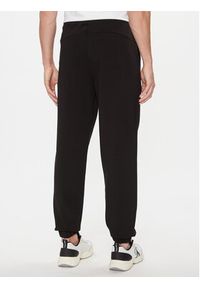 Calvin Klein Spodnie dresowe Embossed Logo K10K112198 Czarny Relaxed Fit. Kolor: czarny. Materiał: bawełna #2