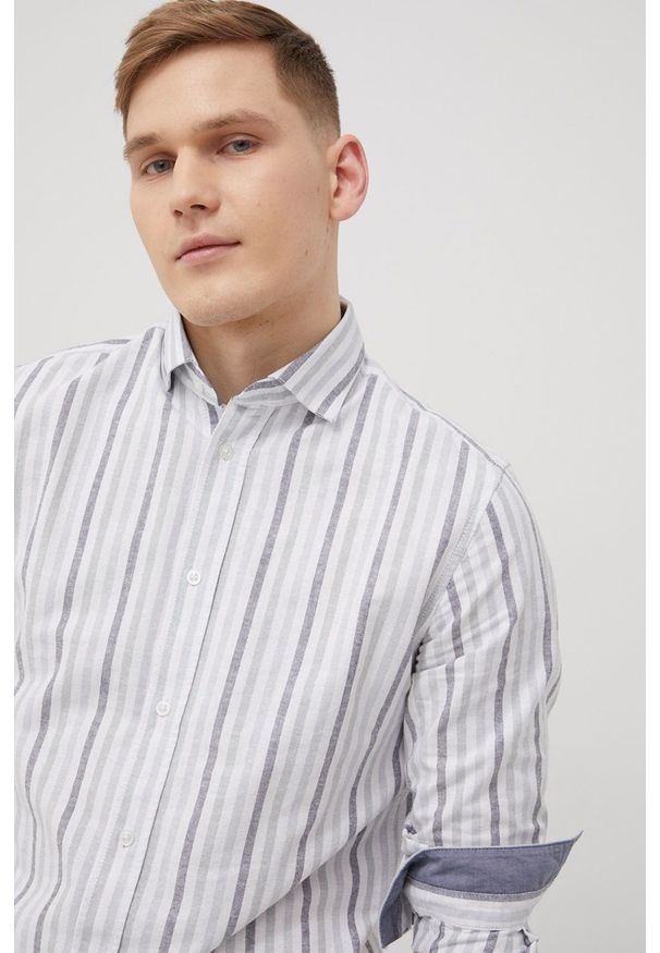 Tom Tailor koszula bawełniana męska regular z kołnierzykiem klasycznym. Typ kołnierza: kołnierzyk klasyczny. Kolor: niebieski. Materiał: bawełna. Styl: klasyczny