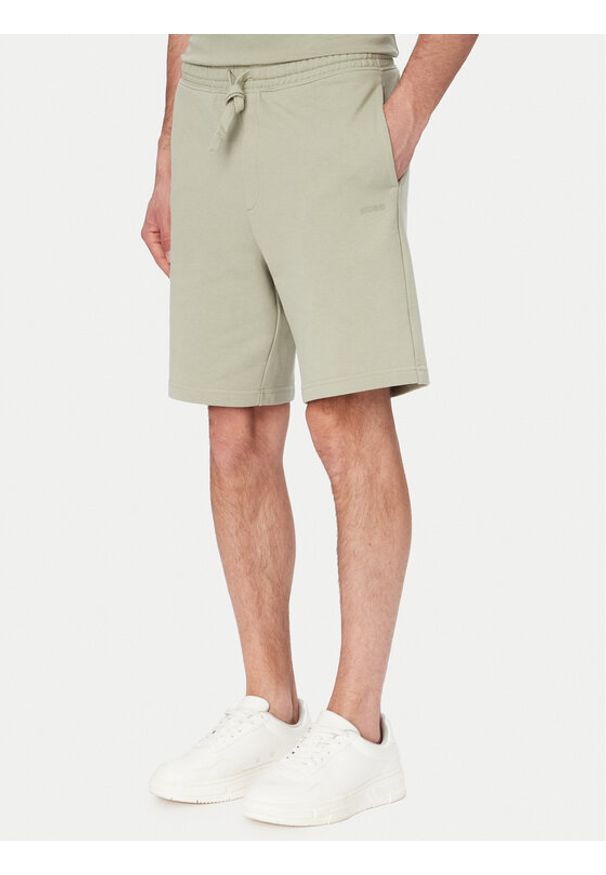 Hugo - HUGO Szorty materiałowe Dayono 50530696 Zielony jasny Relaxed Fit. Kolor: zielony. Materiał: bawełna