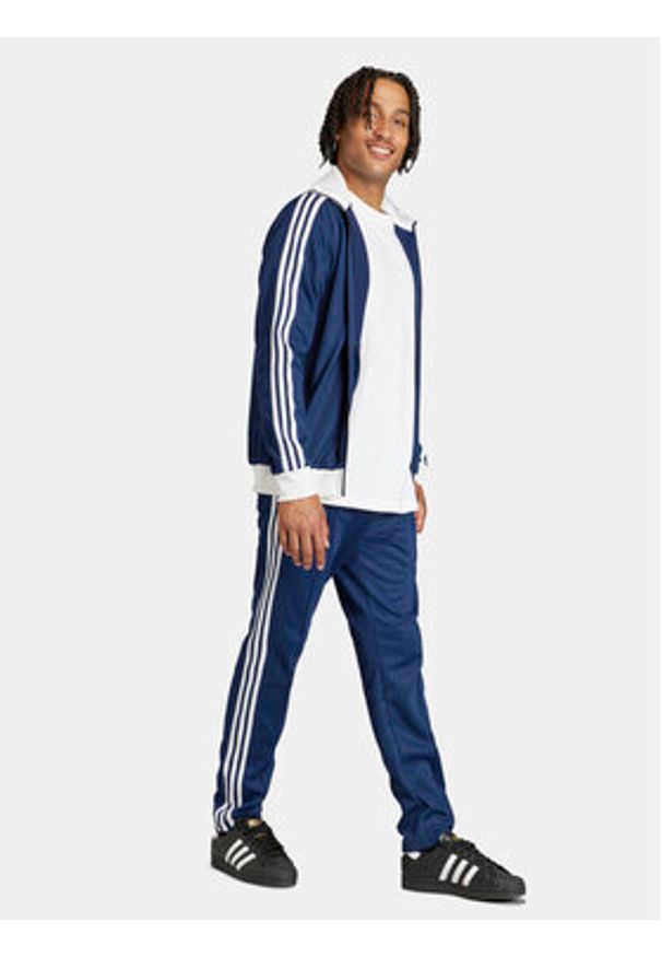 Adidas - adidas Spodnie dresowe adicolor Classics Beckenbauer IP0421 Niebieski Slim Fit. Kolor: niebieski. Materiał: bawełna
