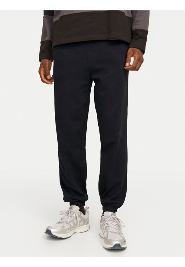 Jack & Jones Spodnie dresowe Morgan 12257964 Czarny Regular Fit. Kolor: czarny. Materiał: bawełna, syntetyk
