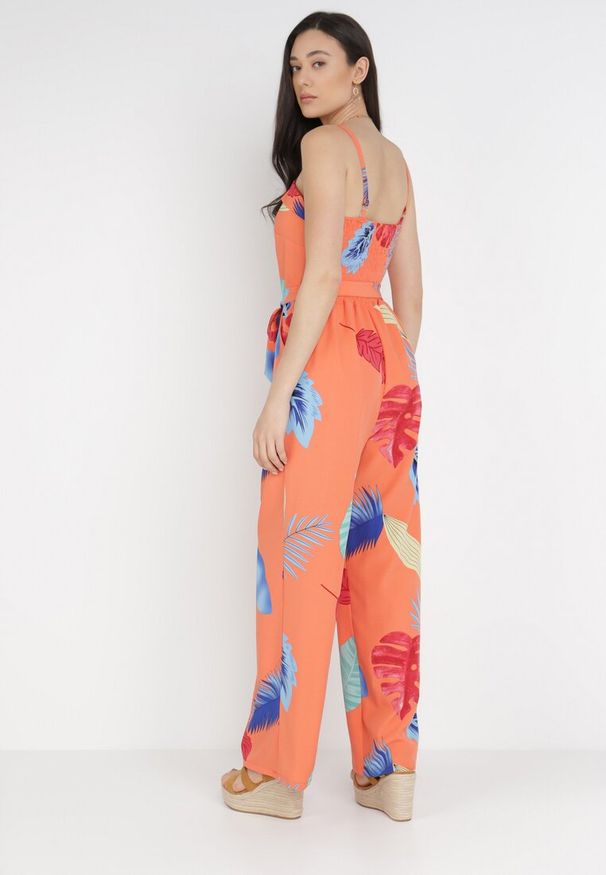 Born2be - Pomarańczowy Kombinezon Cnassiphae. Okazja: na co dzień. Kolor: pomarańczowy. Materiał: materiał, tkanina. Długość rękawa: na ramiączkach. Długość: długie. Wzór: nadruk, aplikacja. Styl: casual