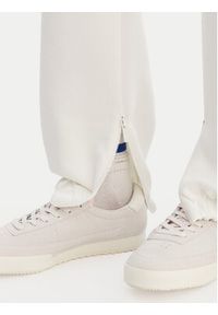 Lacoste Spodnie dresowe XF5244 Écru Regular Fit. Materiał: syntetyk #2