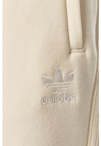 adidas Originals - Spodnie GN3456. Kolor: beżowy. Materiał: poliester, dzianina #4