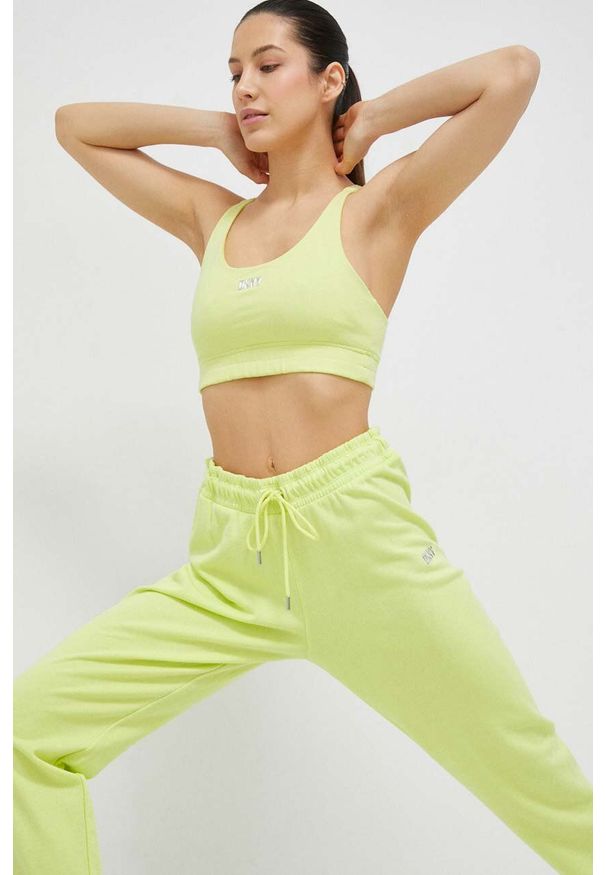 DKNY - Dkny biustonosz sportowy kolor żółty. Kolor: żółty. Materiał: materiał. Wzór: aplikacja