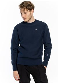 Bluza Champion Premium Crewneck Sweatshirt (214676-BS501). Kolor: niebieski. Materiał: materiał. Styl: sportowy, elegancki