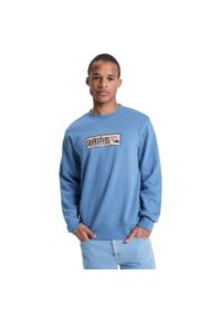 Quiksilver - Bluza z okrągłym dekoltem dla Mężczyzn GRAPHIC Niebieski. Kolor: niebieski. Materiał: materiał, poliester, bawełna. Długość: długie