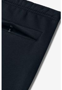 Nike - Spodnie. Kolor: czarny. Materiał: bawełna, poliester, dzianina. Wzór: gładki #2