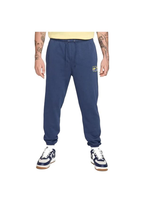 Nike - Spodnie Do Joggingu Męskie Club. Kolor: niebieski. Materiał: dresówka. Sport: bieganie