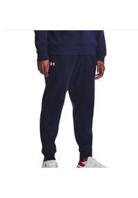 Spodnie sportowe męskie Under Armour 1379774410. Kolor: wielokolorowy, niebieski, biały. Materiał: dresówka. Sport: bieganie #1