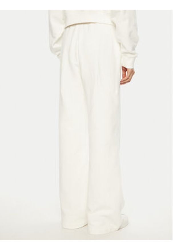 Tommy Jeans Spodnie dresowe H Graphic DW0DW20558 Biały Regular Fit. Kolor: biały. Materiał: bawełna