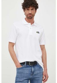 Lacoste polo bawełniane x Netflix kolor biały z aplikacją. Typ kołnierza: polo. Kolor: biały. Materiał: bawełna. Długość: krótkie. Wzór: aplikacja #5