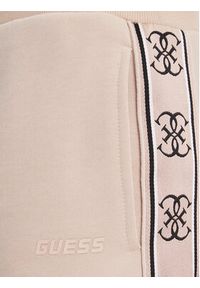 Guess Spodnie dresowe V2YB15 KB3P2 Beżowy Regular Fit. Kolor: beżowy. Materiał: syntetyk