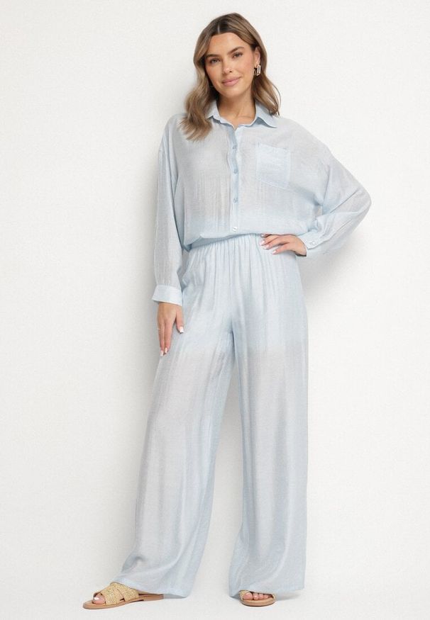 Born2be - Jasnoniebieskie Spodnie Palazzo o Szerokim Kroju z Gumką w Pasie i Wysokim Stanem Jenanetia. Okazja: na co dzień. Stan: podwyższony. Kolor: niebieski. Styl: klasyczny, casual