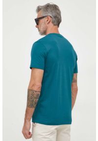 Calvin Klein Jeans t-shirt bawełniany kolor turkusowy z nadrukiem. Kolor: turkusowy. Materiał: bawełna. Wzór: nadruk. Styl: klasyczny #4