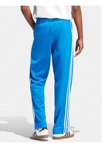 Adidas - adidas Spodnie dresowe adicolor Classics Firebird IJ7056 Niebieski Regular Fit. Kolor: niebieski. Materiał: syntetyk #5