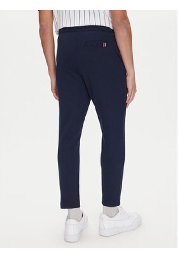 Fila Spodnie dresowe Lobbes FAM0922 Granatowy Tapered Fit. Kolor: niebieski. Materiał: bawełna