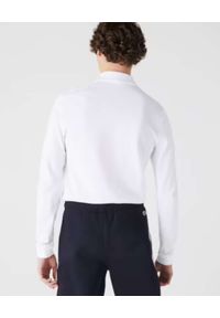 Lacoste - LACOSTE - Biała koszulka polo z długim rękawem Slim Fit. Typ kołnierza: polo. Kolor: biały. Materiał: bawełna, prążkowany. Długość rękawa: długi rękaw. Długość: długie. Styl: klasyczny #2