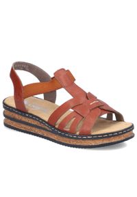 Komfortowe sandały damskie na koturnie brązowe Rieker 62918-62. Kolor: brązowy. Materiał: skóra ekologiczna. Obcas: na koturnie #1