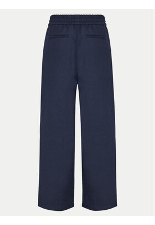 AMI PARIS - AMI Paris Spodnie dresowe UTR212.WV0018 Granatowy Regular Fit. Kolor: niebieski. Materiał: syntetyk