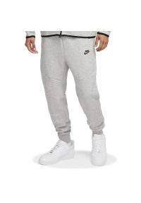 Spodnie męskie Nike Tech BV2671-063 - szare. Kolor: szary. Materiał: poliester, bawełna, dresówka. Wzór: aplikacja #1