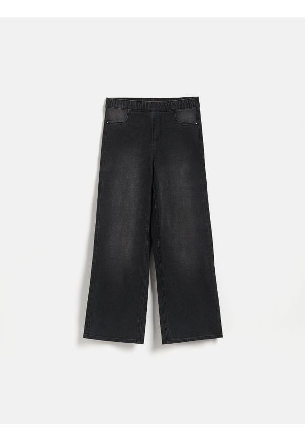 Reserved - Elastyczne jeansy wide leg - czarny. Kolor: czarny